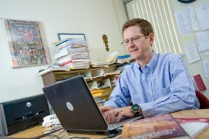 Rob McConnell at desk